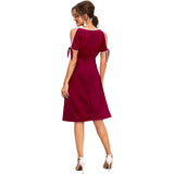 Maroon knitted dress with round neck and no sleeves, midi length