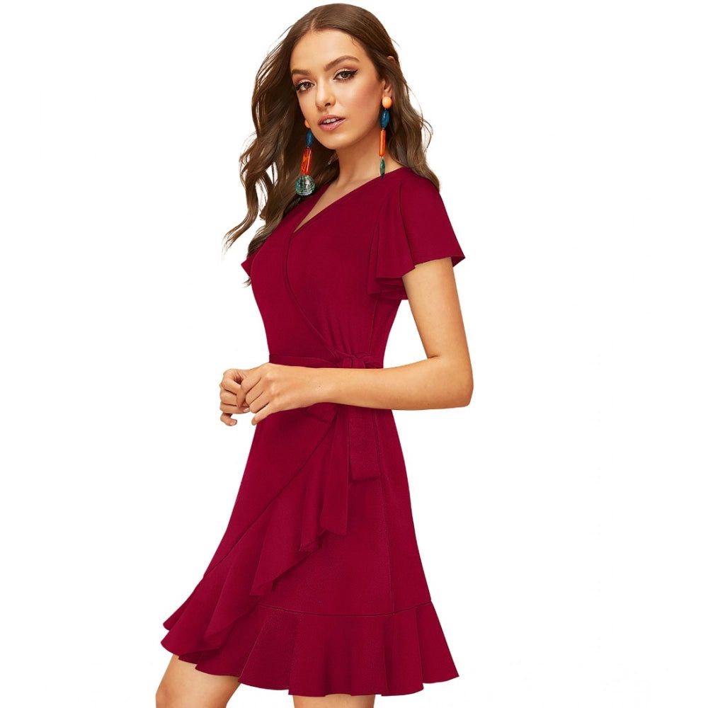 A maroon knit dress with a solid v neck and flared sleeves