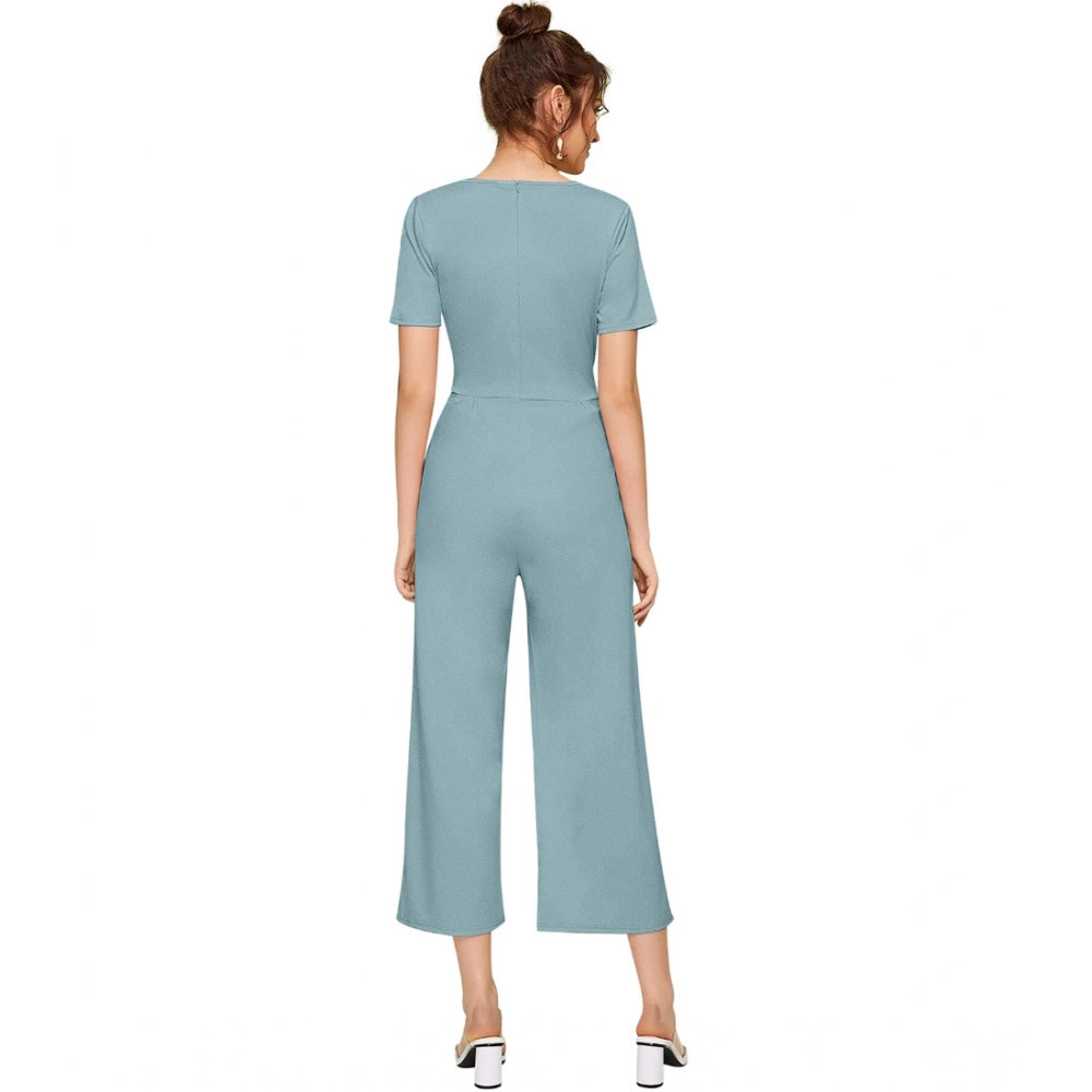 A pale blue stretchy round neck jumpsuit with cap sleeves