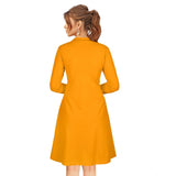 Yellow knitted dress with round neck and full sleeves