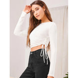 White polyester round neck full sleeve top for women, solid style on hanger