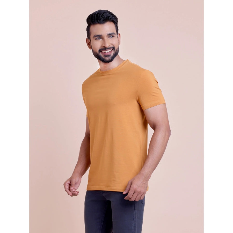 Brown cotton men's casual solid half-sleeve round neck t-shirt on model