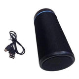 Black plastic rubber wireless speaker with USB cable
