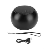 Black wireless Bluetooth speaker with a black wire, 3.5mm audio jack
