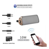 Grey plastic rubber wireless TG111 Bluetooth speaker with USB chargeable, portable audio device on table