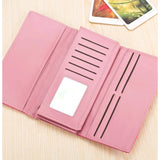 Red faux leather medium wallet with snap button closure, solid design for women's accessories