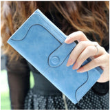 Blue faux leather medium wallet with snap button closure, solid design for women's fashion accessories