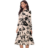 Cream printed v-neck long sleeve dress with full skirt