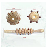 Wood 6-wheel massage roller for body therapy, natural wooden scraping tool on a flat surface