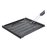 Black steel toaster grill with foldable handle, perfect for BBQ on kitchen counter