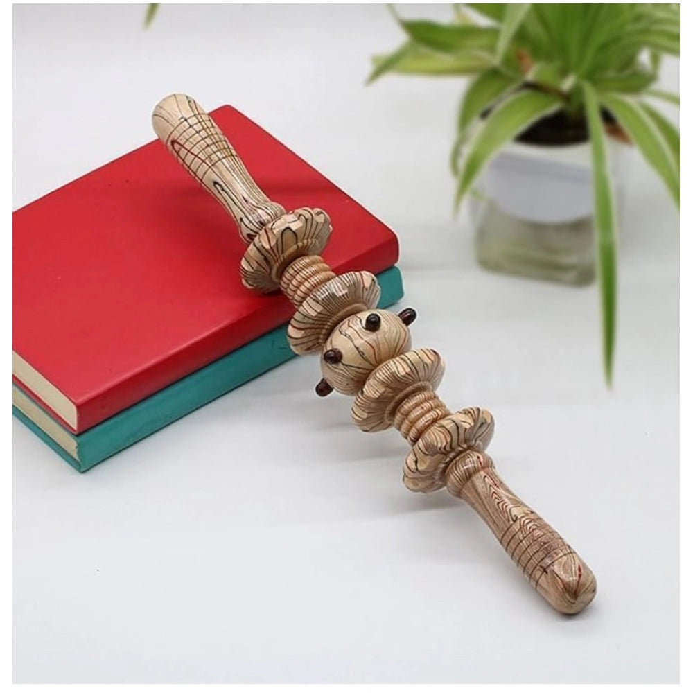 Wooden 7-wheel Gua Sha massager roller for facial therapy, wood trigger point tool on table