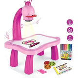 A multicolor plastic drawing projector table with a built-in seat and a light. It has a pink top, and there are markers beside it