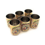 Gold steel Meenakari peacock design decorative glass tumblers set, intricate Indian artwork on display
