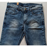 Men's cotton blended solid tapered blue jeans - mid rise, button closure