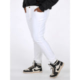 Men's cotton blended solid plus size white jeans, mid rise with button closure on model