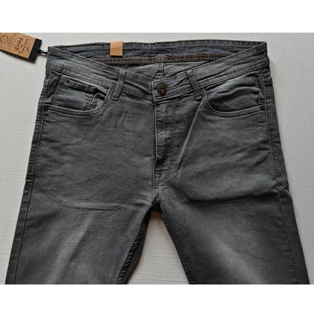 Grey cotton blended tapered jeans for men on model, solid pattern, mid-rise with button closure