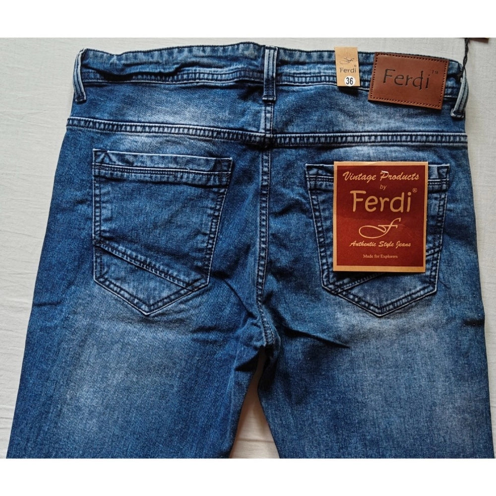 Men's blue cotton blended tapered jeans - solid, mid-rise style with button closure on model
