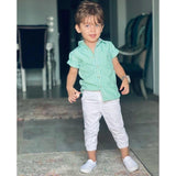 Green Lycra printed casual wear kids' shirt & shorts set - short sleeve, boy's style on mannequin