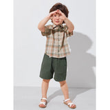 Green Lycra printed kid's casual wear short sleeve shirt & shorts set, vibrant pattern design for active play