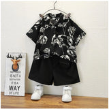 Black lycra printed casual wear kid's shirt & shorts set, ideal for active play