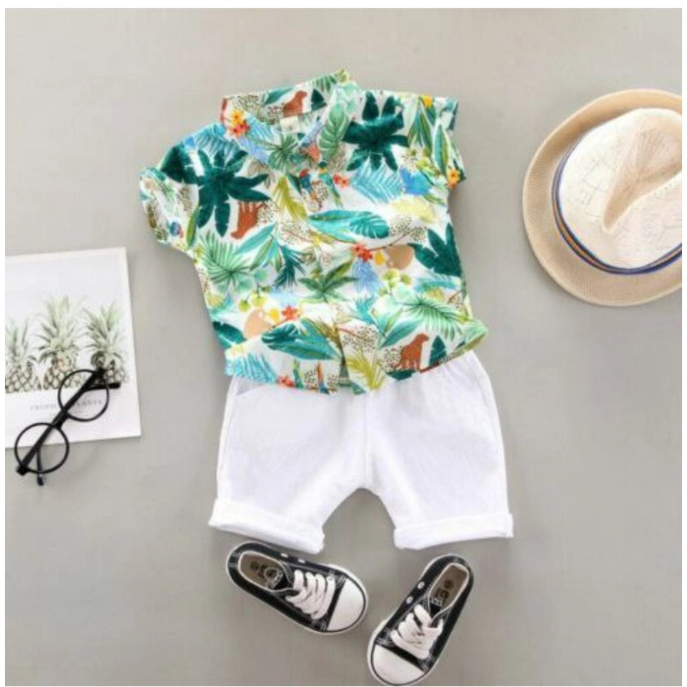 Green Lycra printed boy's casual wear shirt & shorts set, short sleeve, vibrant design on display
