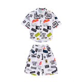White Lycra kid's printed casual wear shirt & shorts set, short-sleeved boy's shorts on display