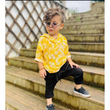 Yellow Lycra printed casual wear boy's shirt & shorts set, vibrant design for active play
