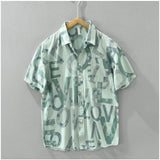 Green cotton casual shirt with printed 3/4th sleeves and collar