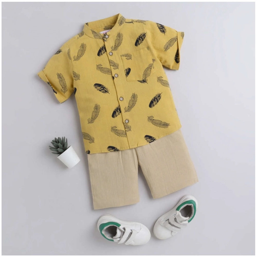 Yellow cotton blend printed short sleeve shirt & shorts set for kids, vibrant design on casual outfit