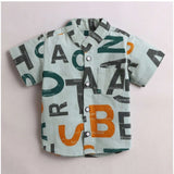 Multi-color cotton blend printed short sleeve shirt & shorts set for kids, casual outfit on display