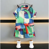 MultiColor Lycra blend printed short sleeve shirt & shorts set for kids, vibrant patterns on activewear