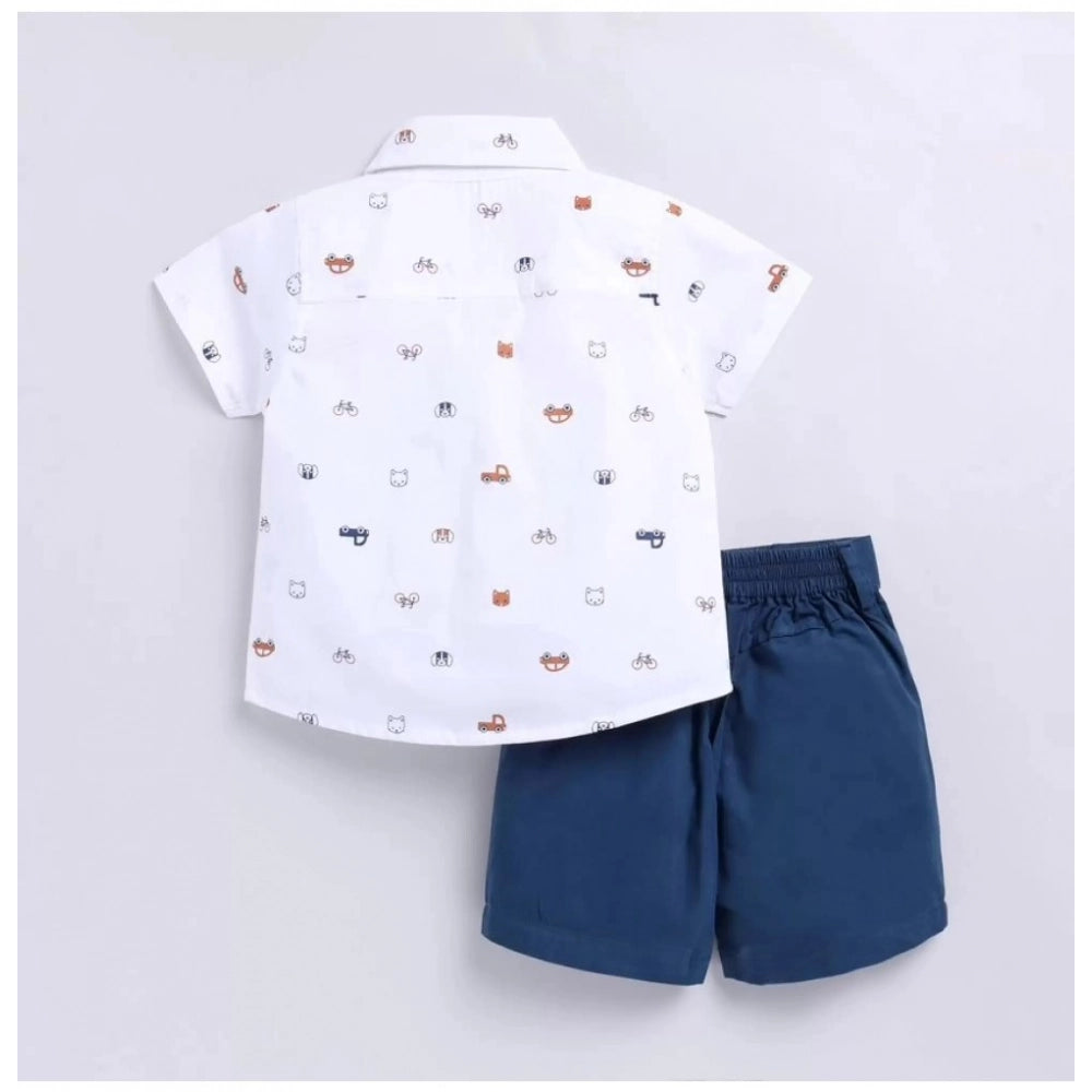 White cotton blend boy's short sleeve shirt & shorts set with vibrant printed pattern