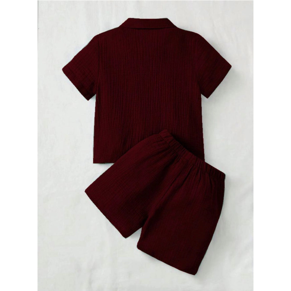 Maroon popcorn solid short sleeve shirt and shorts set for boys, casual outfit on display