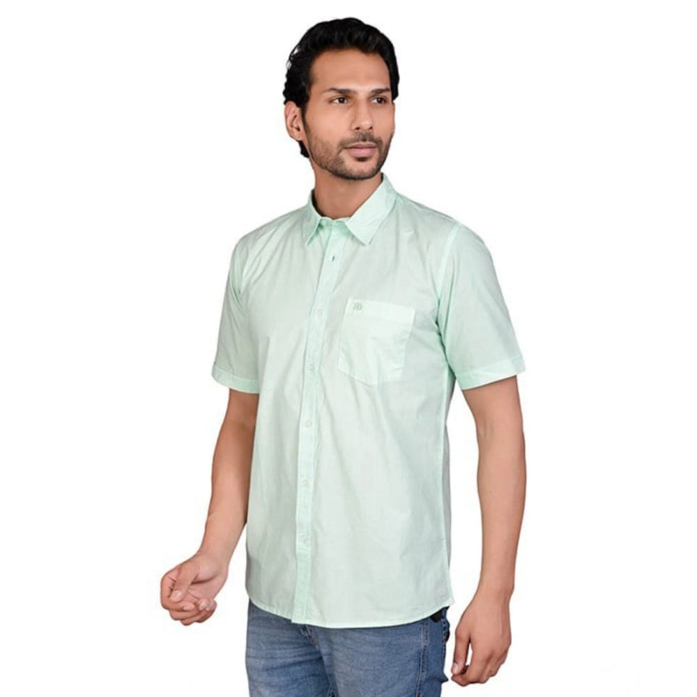 Sea Green Cotton Men's Casual Half-Sleeve Solid Shirt on hanger