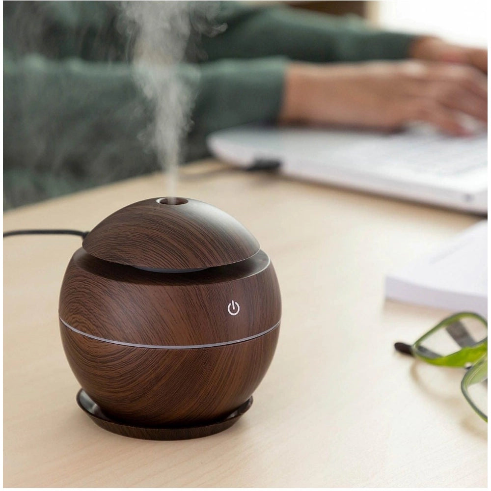 Brown wooden humidifier with LED lights, ideal for bedroom, office, or home use