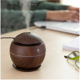 Brown wooden humidifier with LED lights, ideal for bedroom, office, or home use