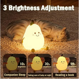 The text in the image is unclear, but it features a night light shaped like a pear