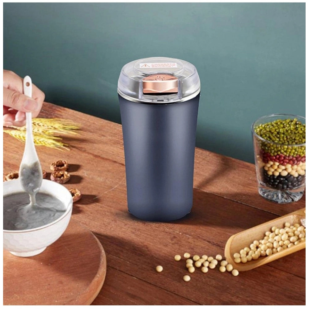 Blue plastic & steel electric coffee grinder for herbs, beans, and peanuts. One-touch push-button operation. May slightly vary from image depictions