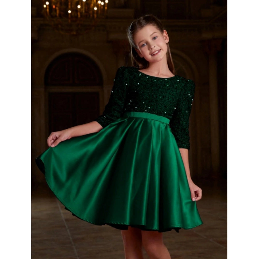 Green rayon girl's western dress with short sleeves and round neck, solid pattern