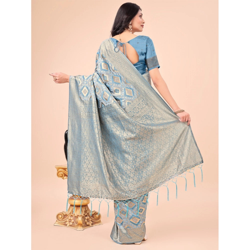 Sky blue cotton printed saree with unstitched blouse, 5.5mtr length on mannequin for traditional Indian wear
