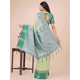 Light green lichi silk printed saree with unstitched blouse, vibrant floral design on woman model