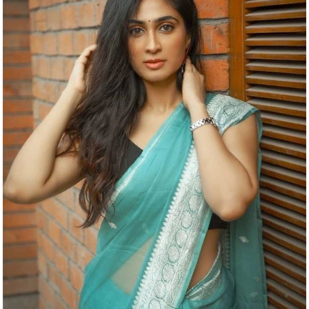 Sky blue cotton printed saree with unstitched blouse, vibrant design on traditional Indian attire