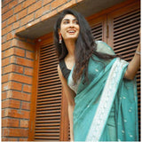 Sky Blue cotton printed saree with unstitched blouse, vibrant design on traditional Indian wear
