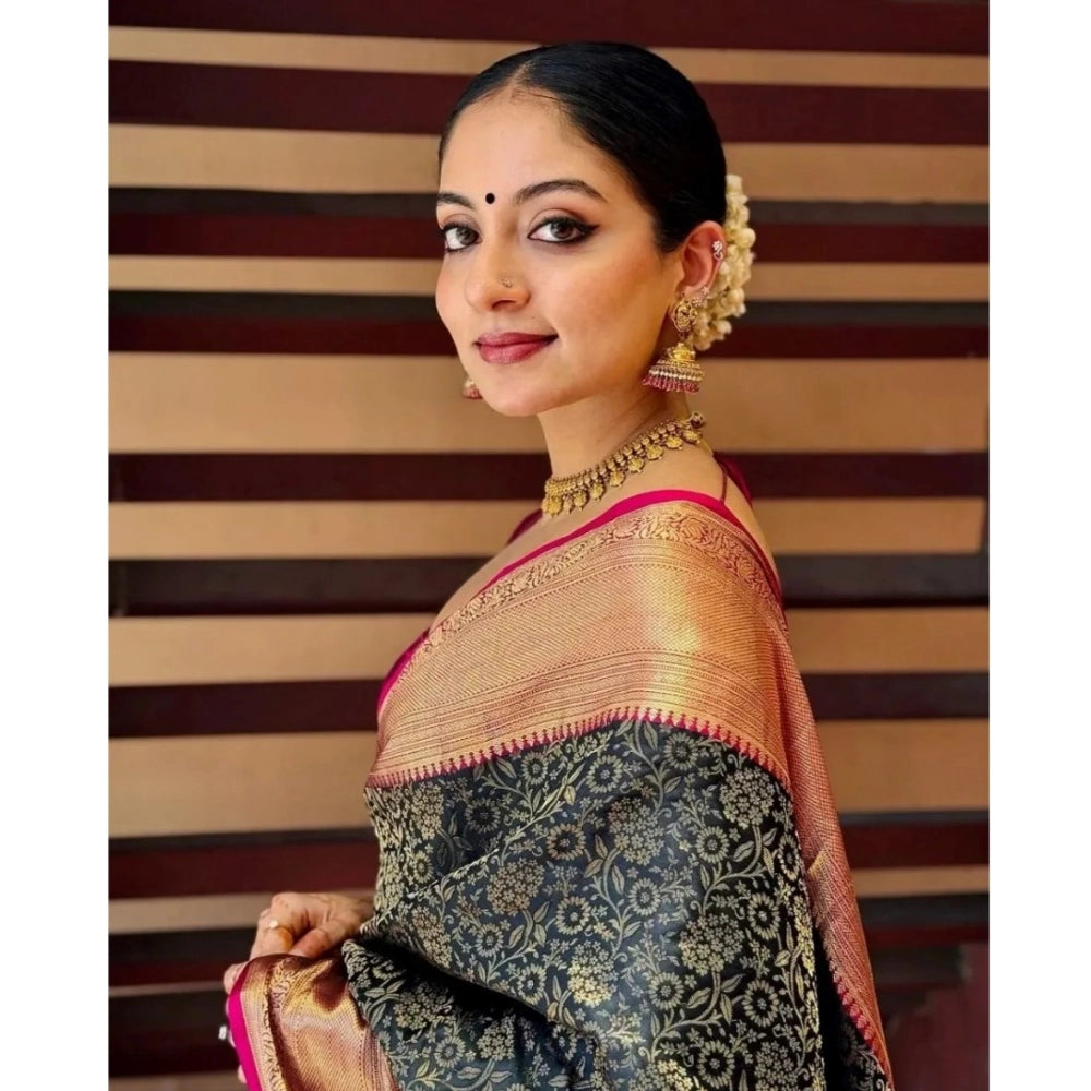 Green silk printed saree with unstitched blouse, vibrant floral pattern on display