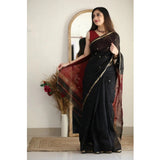 Black cotton printed saree with unstitched blouse (5.5Mtr) - vibrant patterns on traditional Indian attire