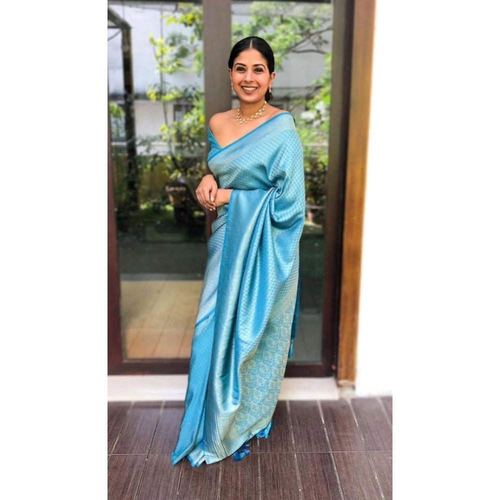 Sky blue silk printed saree with unstitched blouse, vibrant floral design on display