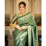 Green silk printed saree with unstitched blouse (5.5mtr), traditional Indian wear on display stand