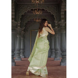 Women's cotton pista printed saree with unstitched blouse, vibrant floral design on display