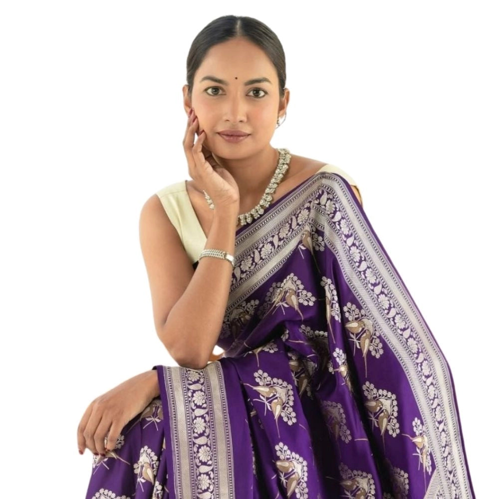 Purple silk printed saree with unstitched blouse (5.5mtr), vibrant design showcased on mannequin