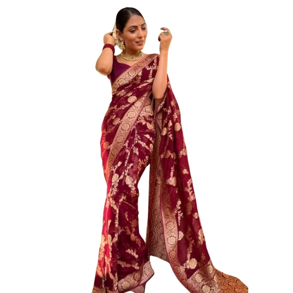 Maroon silk printed saree with unstitched blouse, luxurious Eastern wear for women on mannequin